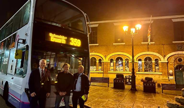 Cllrs Tim Mitchell and David Robinson pictured with the number 359 bus